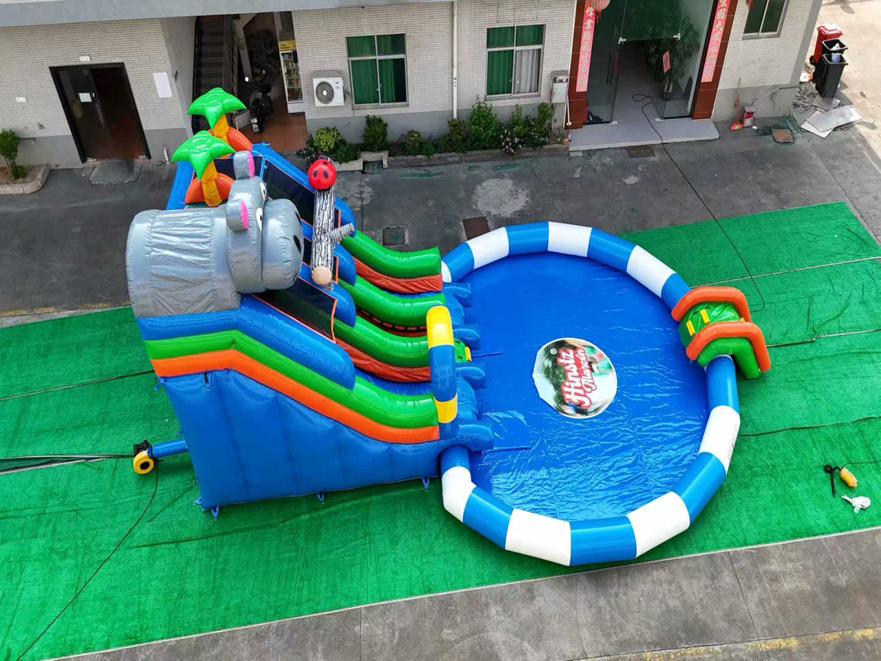 Inflatable colorful water park slide