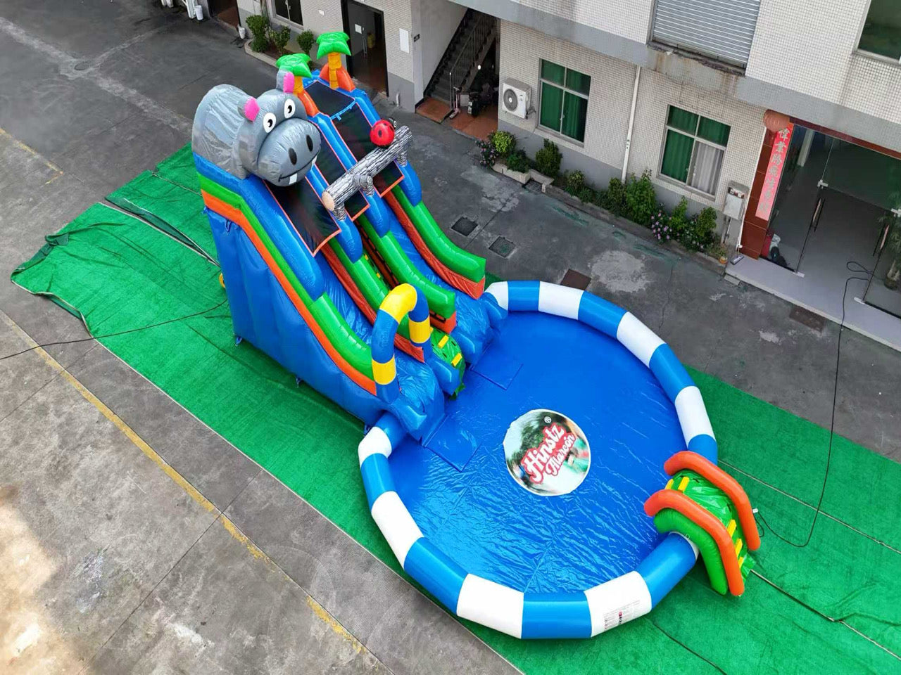 Inflatable colorful water park slide