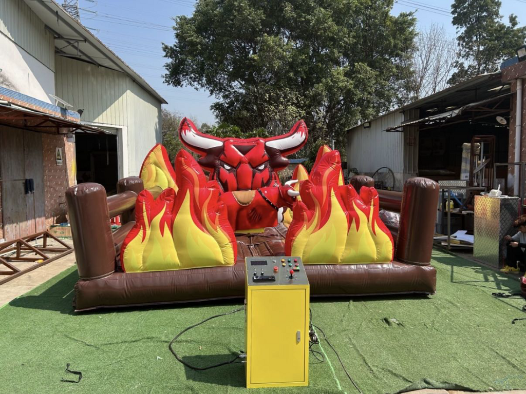 Inflatable mechanical bull trampoline