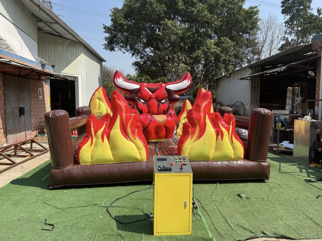 Inflatable mechanical bull trampoline