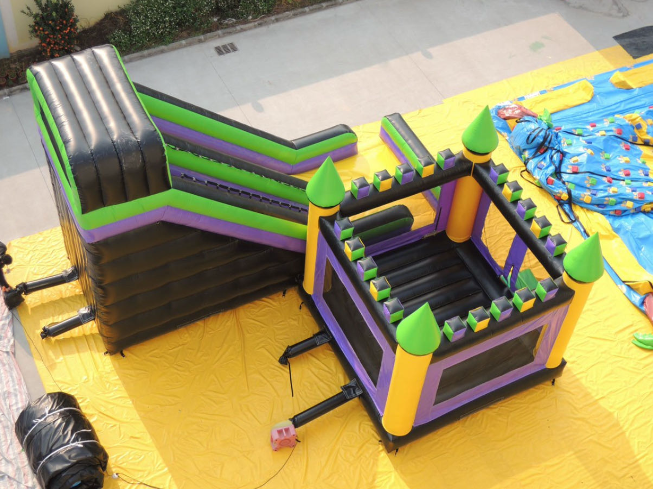 Inflatable trampoline slide