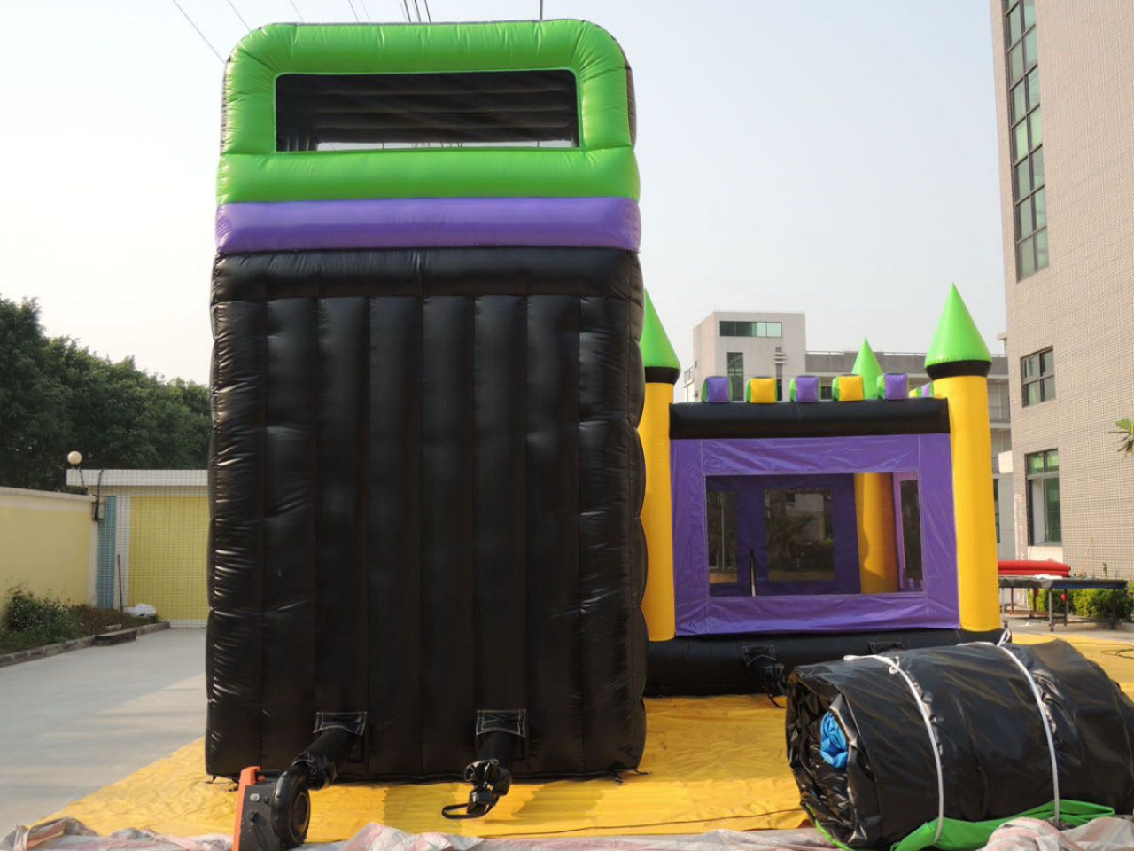 Inflatable trampoline slide