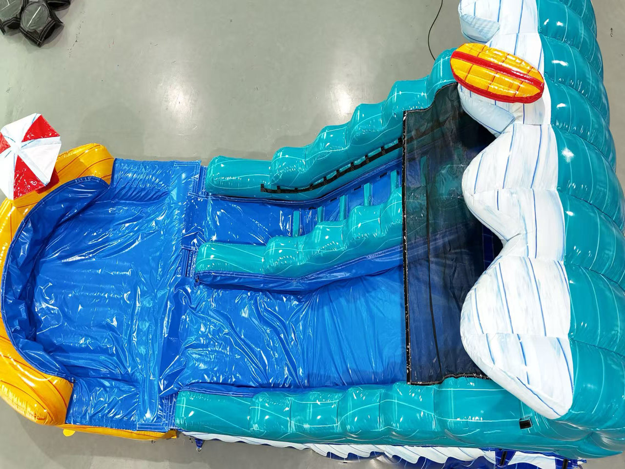 Colorful inflatable beach slide