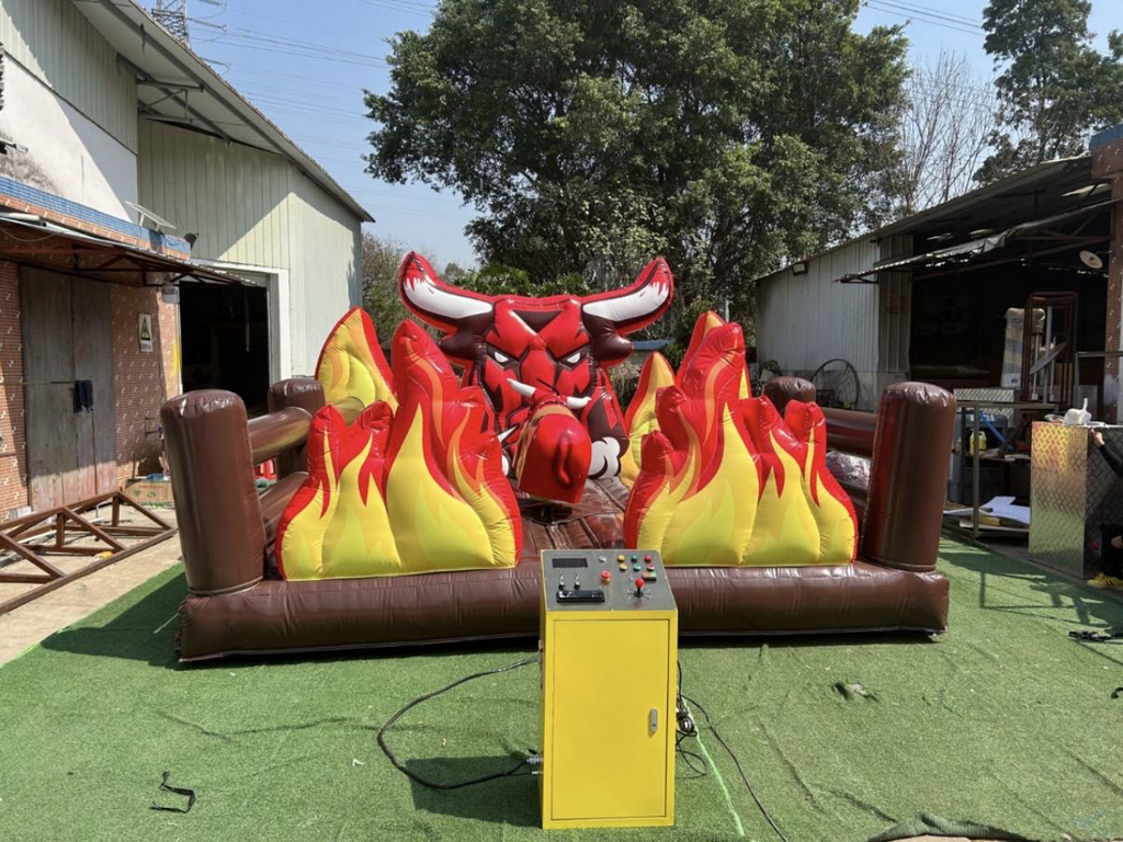 Inflatable mechanical bull trampoline