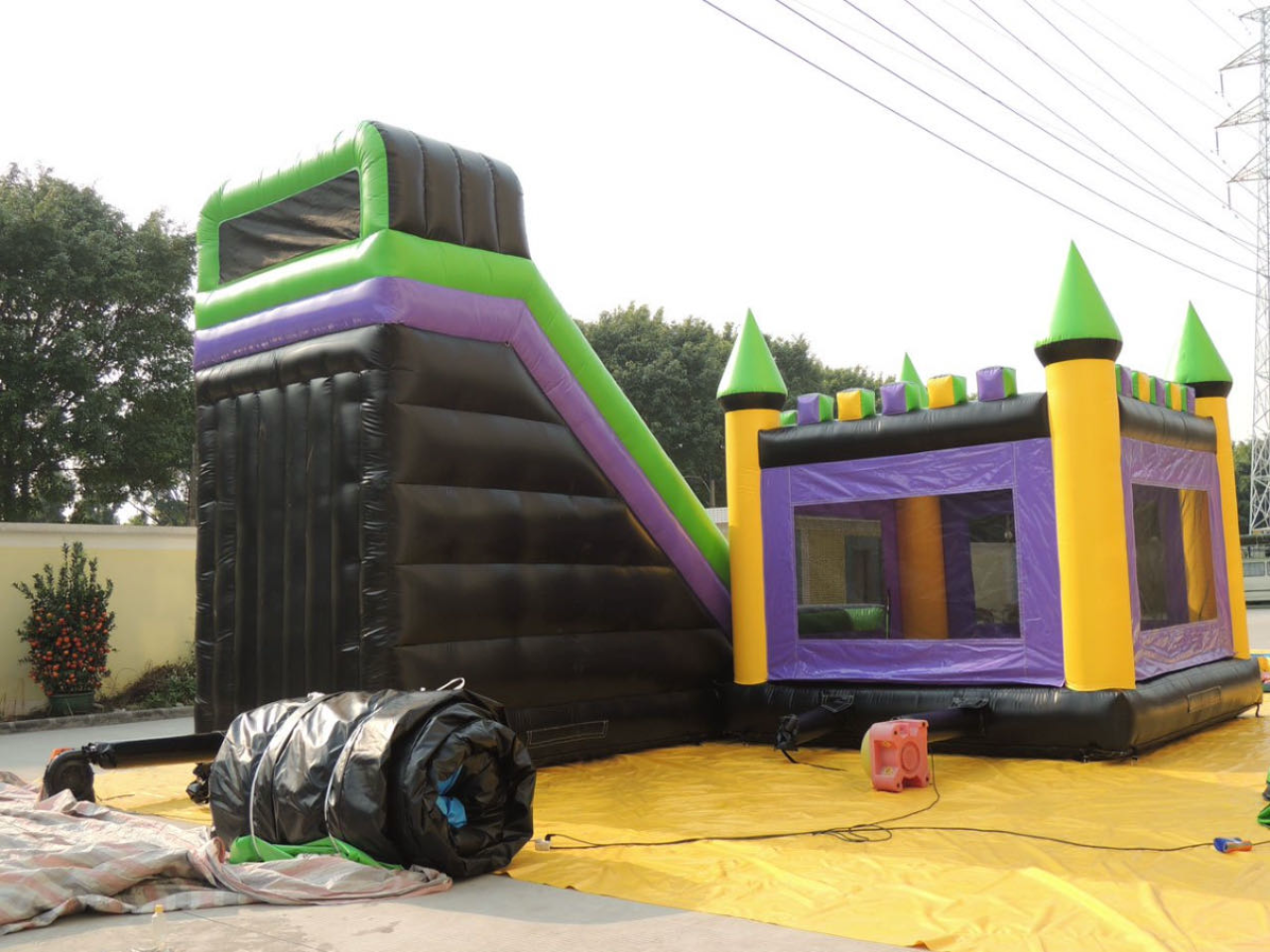 Inflatable trampoline slide