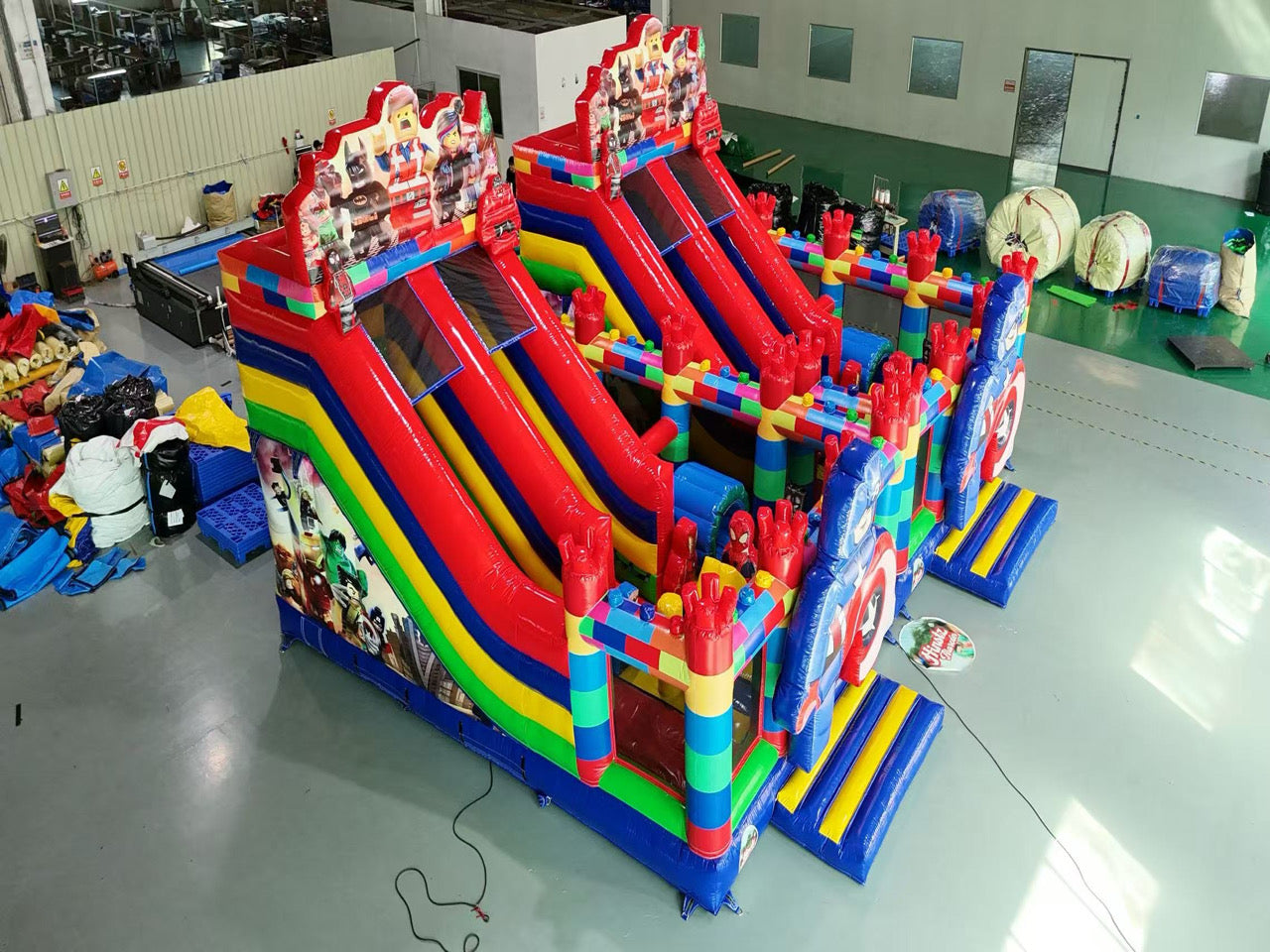 Lego themed inflatable slide